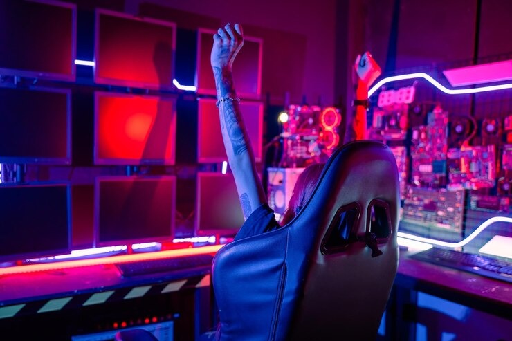 Neon nightclub aesthetic with glowing red and pink LED panels and raised hand