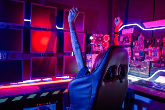 Neon nightclub aesthetic with glowing red and pink LED panels and raised hand