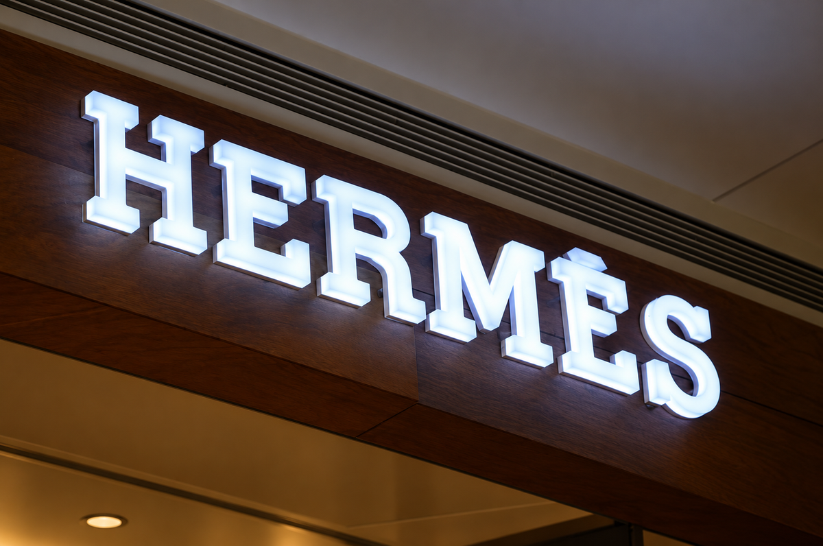 Fully illuminated 3D business name installed across an American storefront