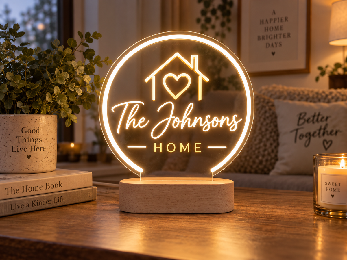 Custom business logo neon sign displayed on a wooden base at a counter